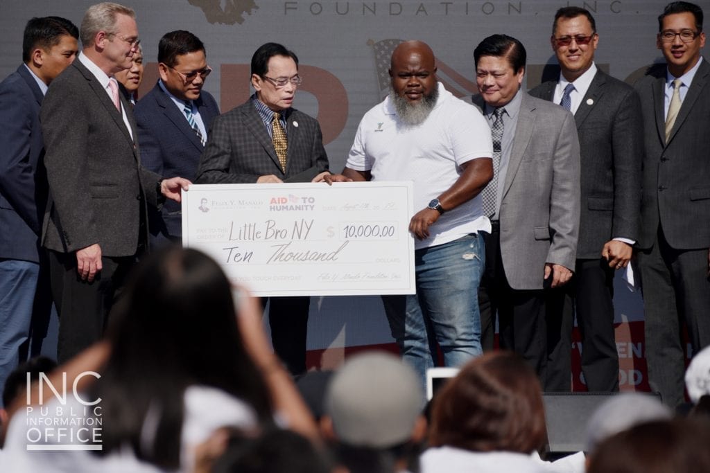 Brother Glicerio B. Santos Jr., General Auditor of the Iglesia Ni Cristo and representative of the Felix Y. Manalo Foundation presenting Little Bro NY with a donation of $10,000