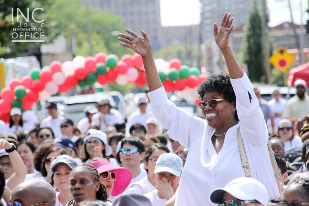 An attendee cheering for one of the ten local organizations who were honored at the